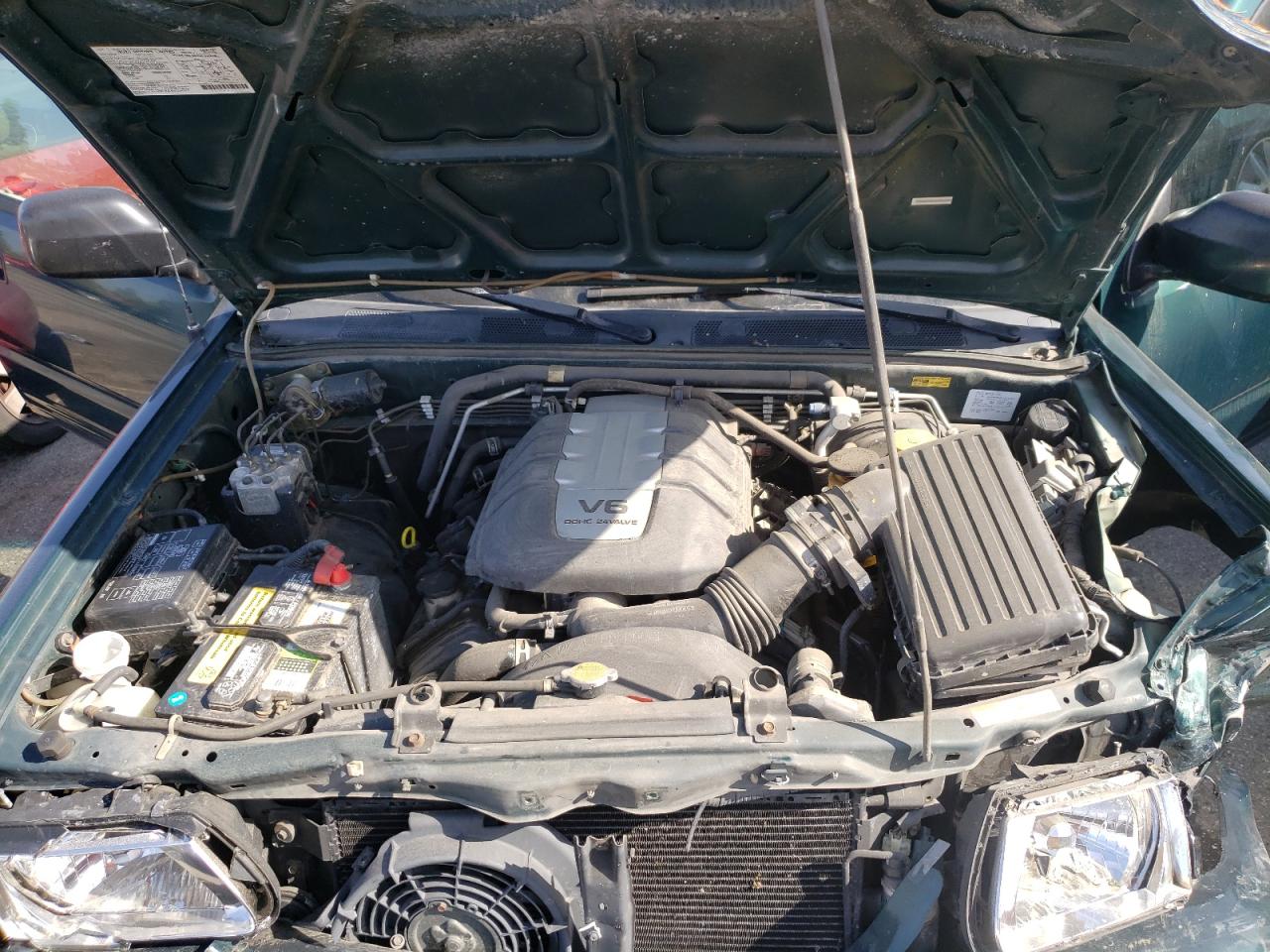 Photo 7 from auction – 2001 HONDA PASSPORT E with VIN 4S6DM58W814414989