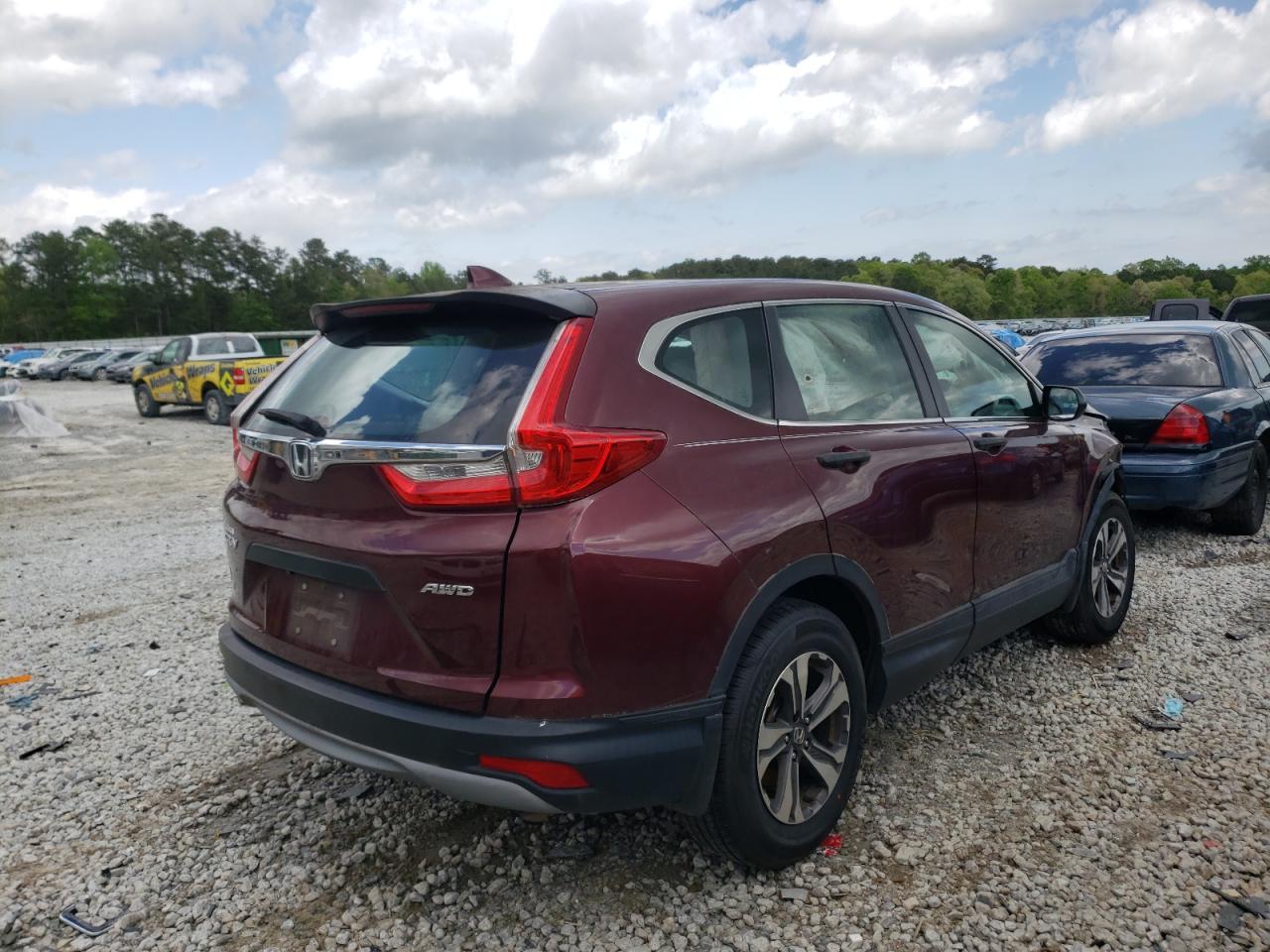 Photo 4 from auction – 2017 HONDA CR-V LX with VIN 2HKRW6H33HH213532