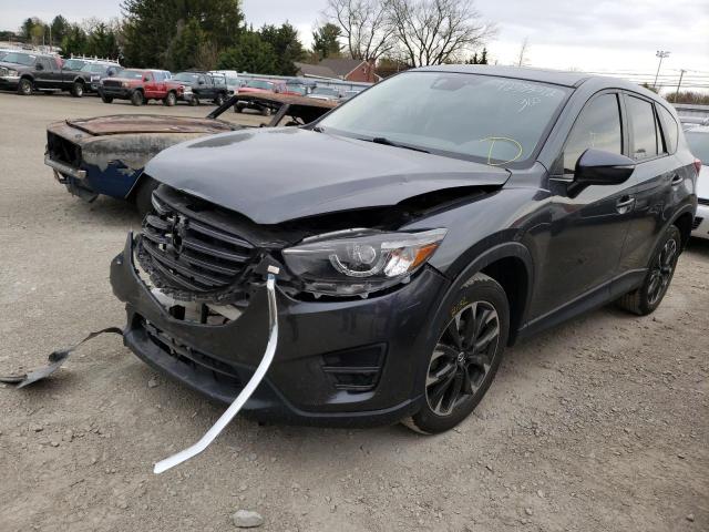 Photo 2 from auction – 2016 MAZDA CX-5 GT with VIN JM3KE4DY0G0616509