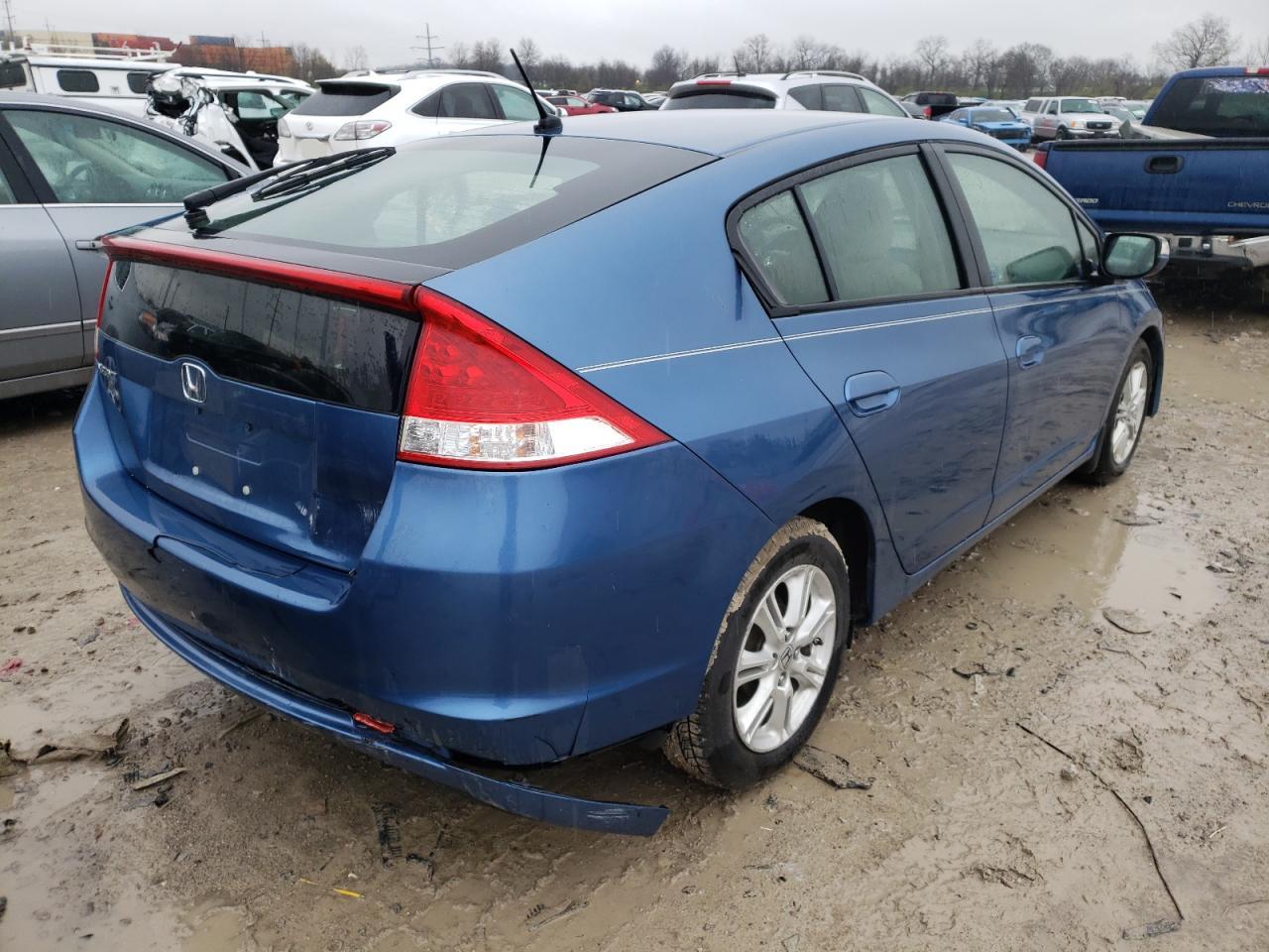 Photo 4 from auction – 2010 HONDA INSIGHT EX with VIN JHMZE2H76AS014818