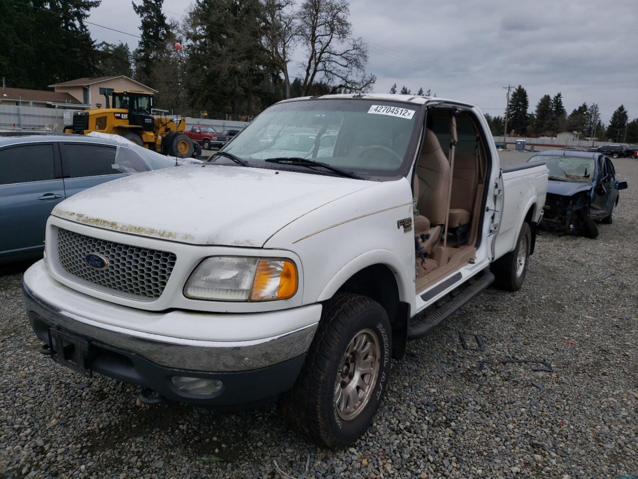 Photo 2 from auction – 1999 FORD F150 with VIN 1FTRX18L6XNC11496