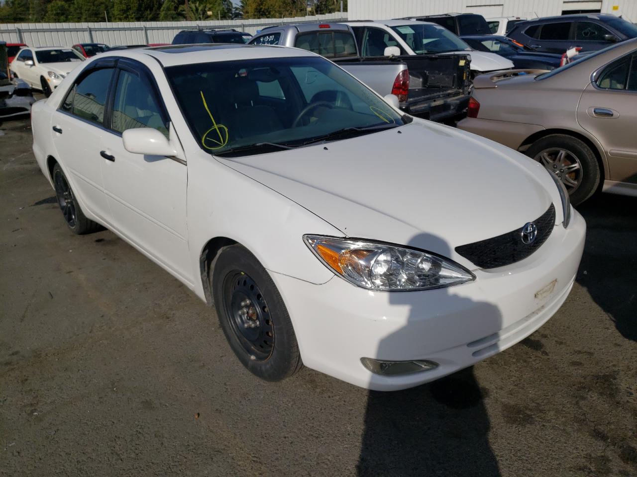 TOYOTA CAMRY LE 2004 with VIN 4T1BE32K64U360877 - Photo from auction