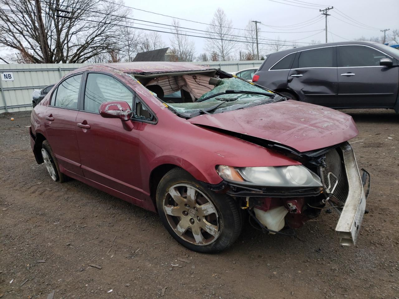 HONDA CIVIC LX 2011 with VIN 2HGFA1F50BH518836 - Photo from auction