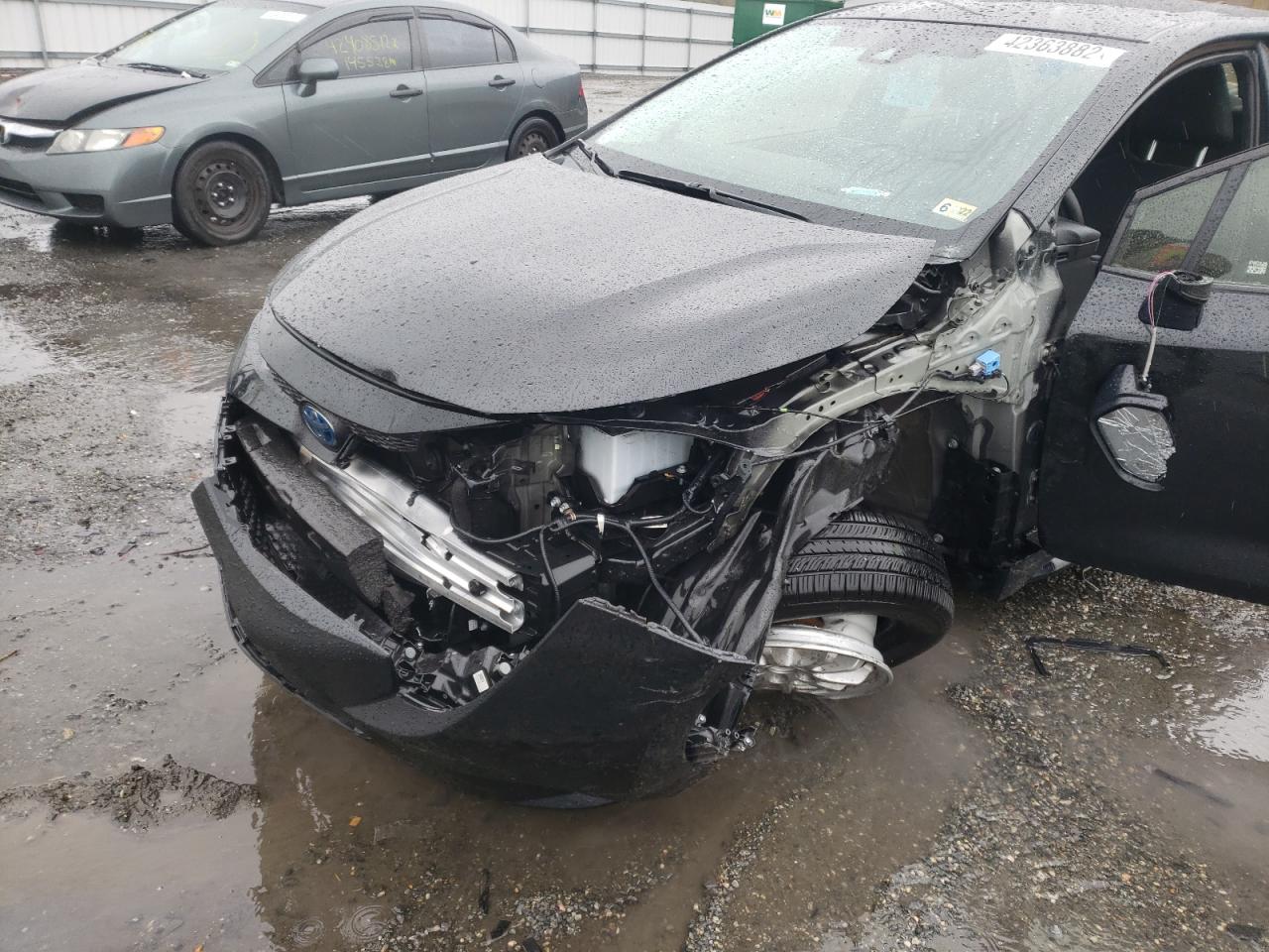 Photo 9 from auction – 2021 TOYOTA COROLLA LE with VIN JTDEAMDE6MJ001492