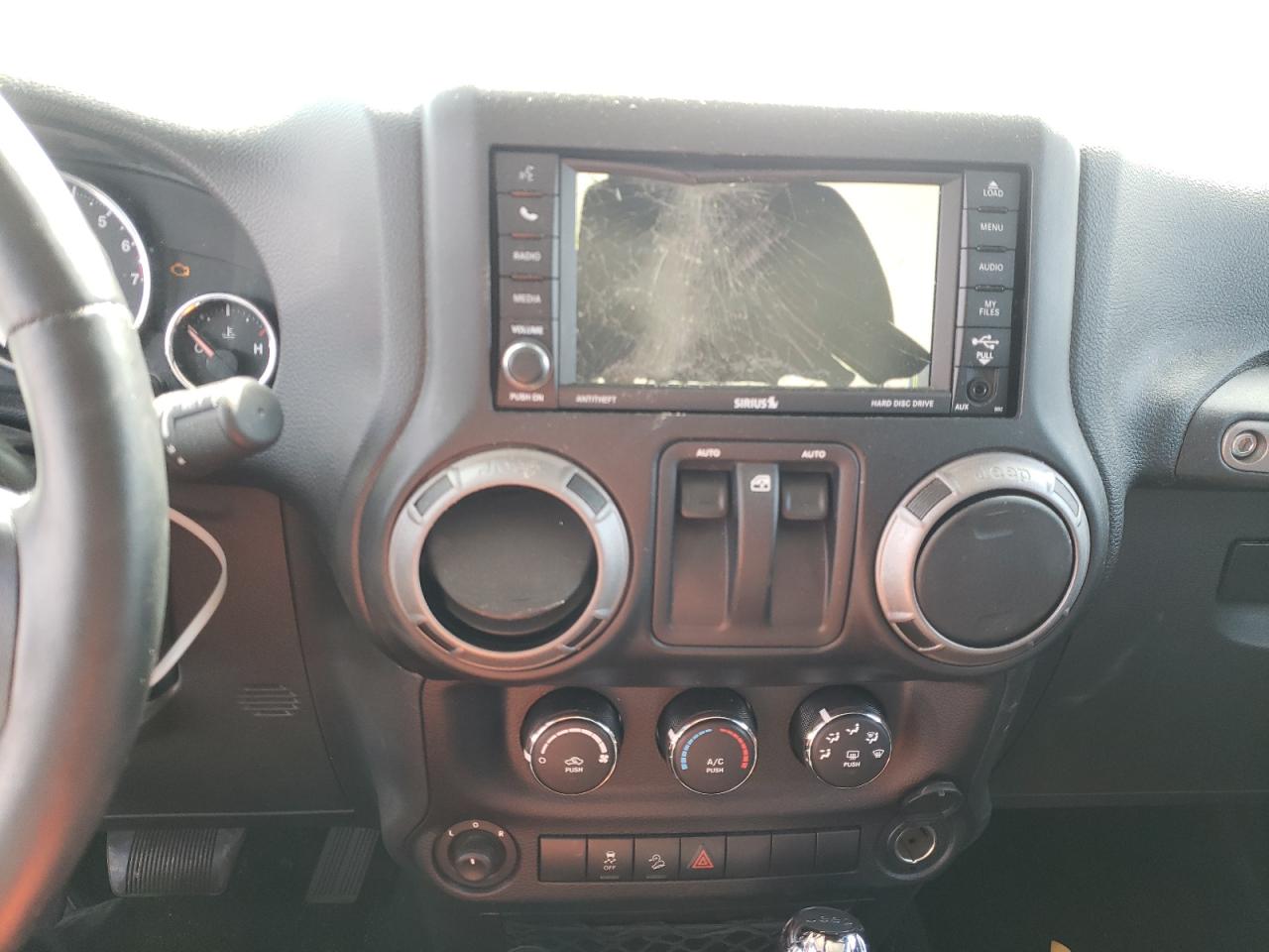 Photo 9 from auction – 2015 JEEP WRANGLER S with VIN 1C4AJWAGXFL614092