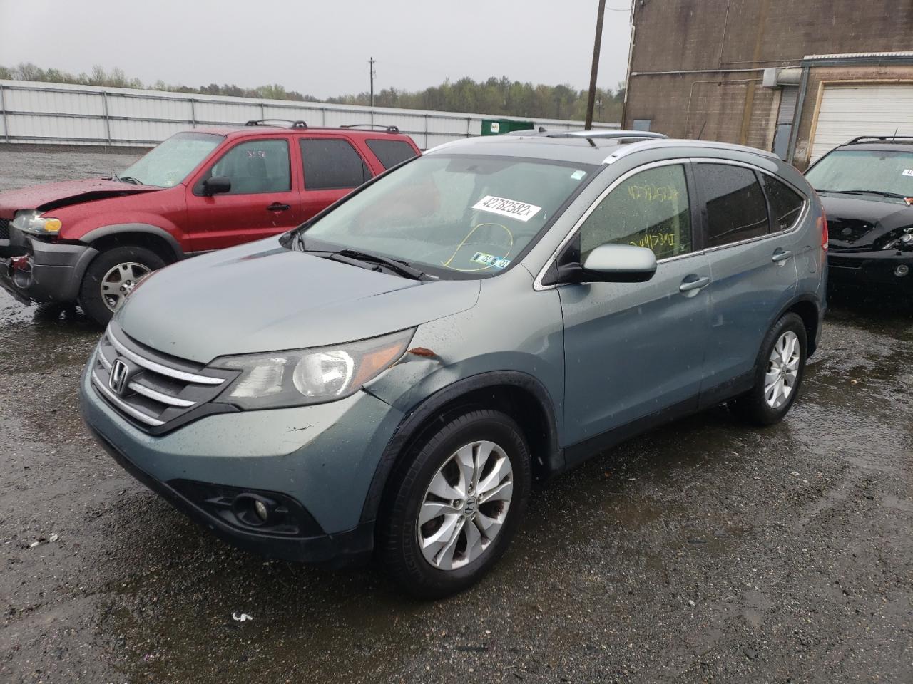Photo 2 from auction – 2012 HONDA CRV with VIN JHLRM4H72CC015898