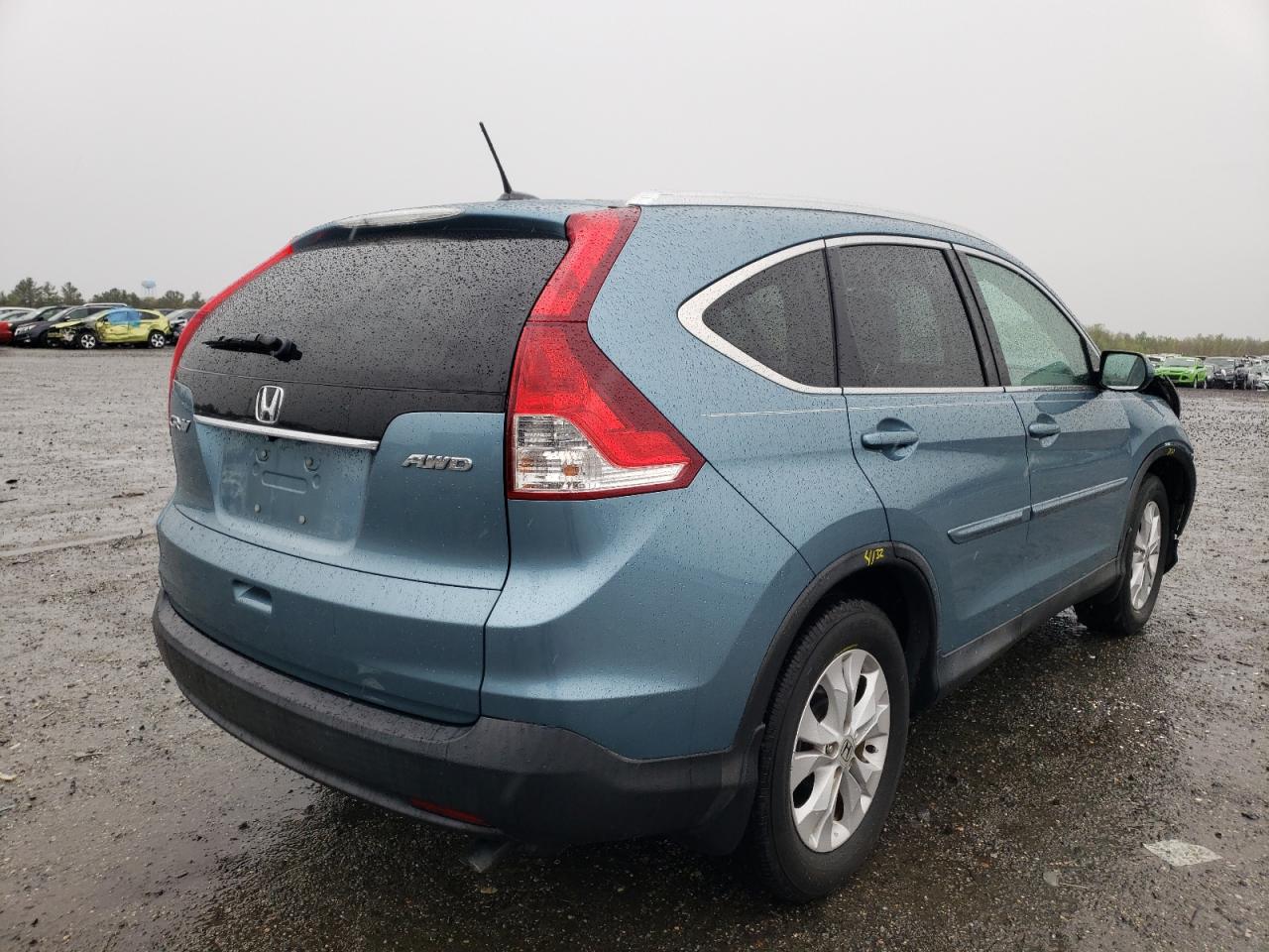 Photo 4 from auction – 2014 HONDA CR-V EXL with VIN 2HKRM4H73EH717541