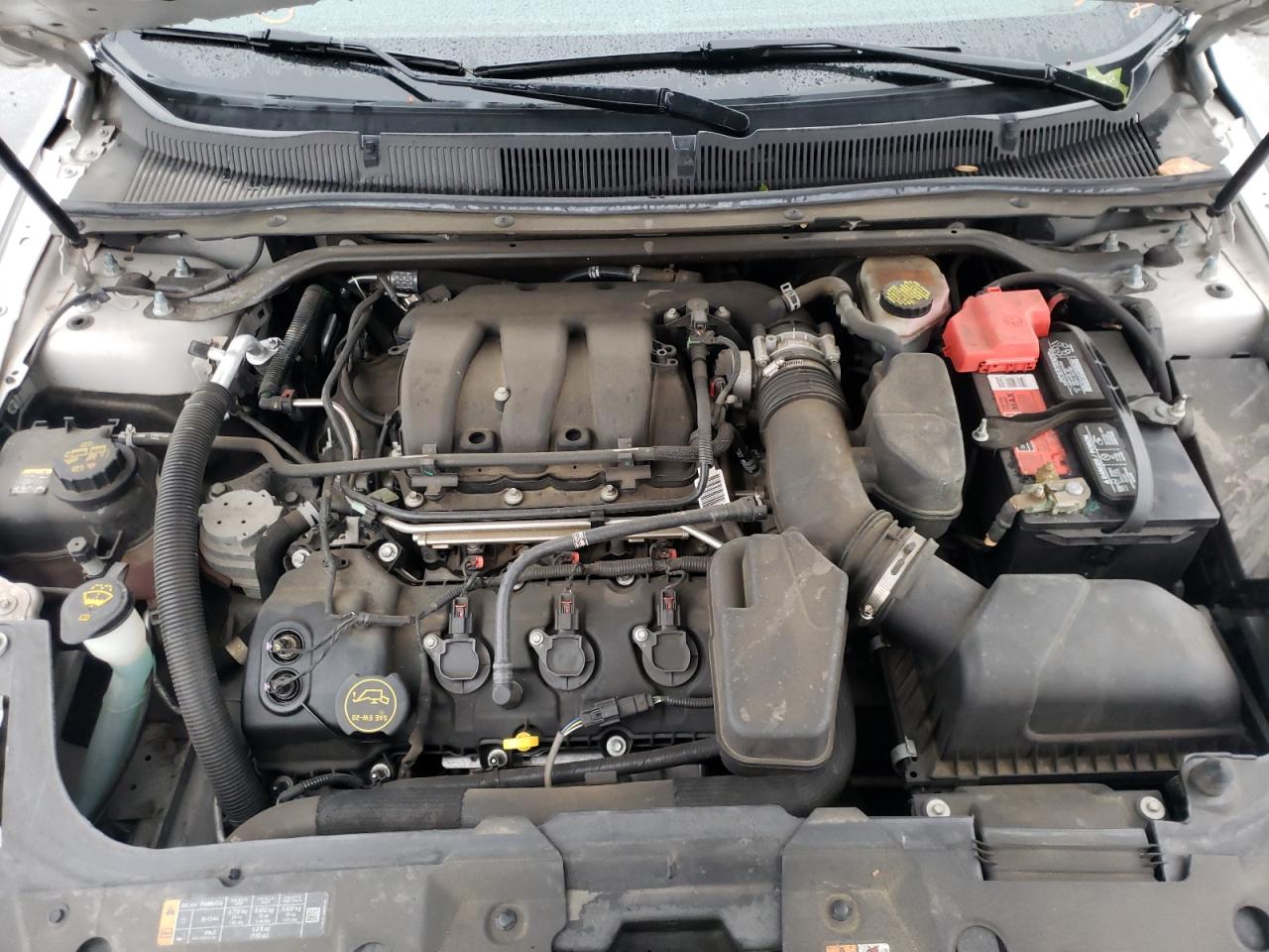 Photo 7 from auction – 2016 FORD TAURUS SEL with VIN 1FAHP2E89GG112831