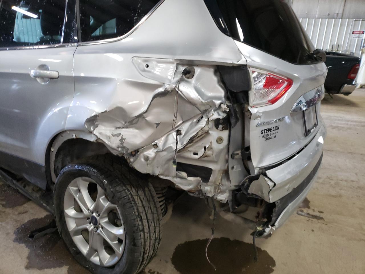 Photo 9 from auction – 2014 FORD ESCAPE TIT with VIN 1FMCU9JX3EUB30366