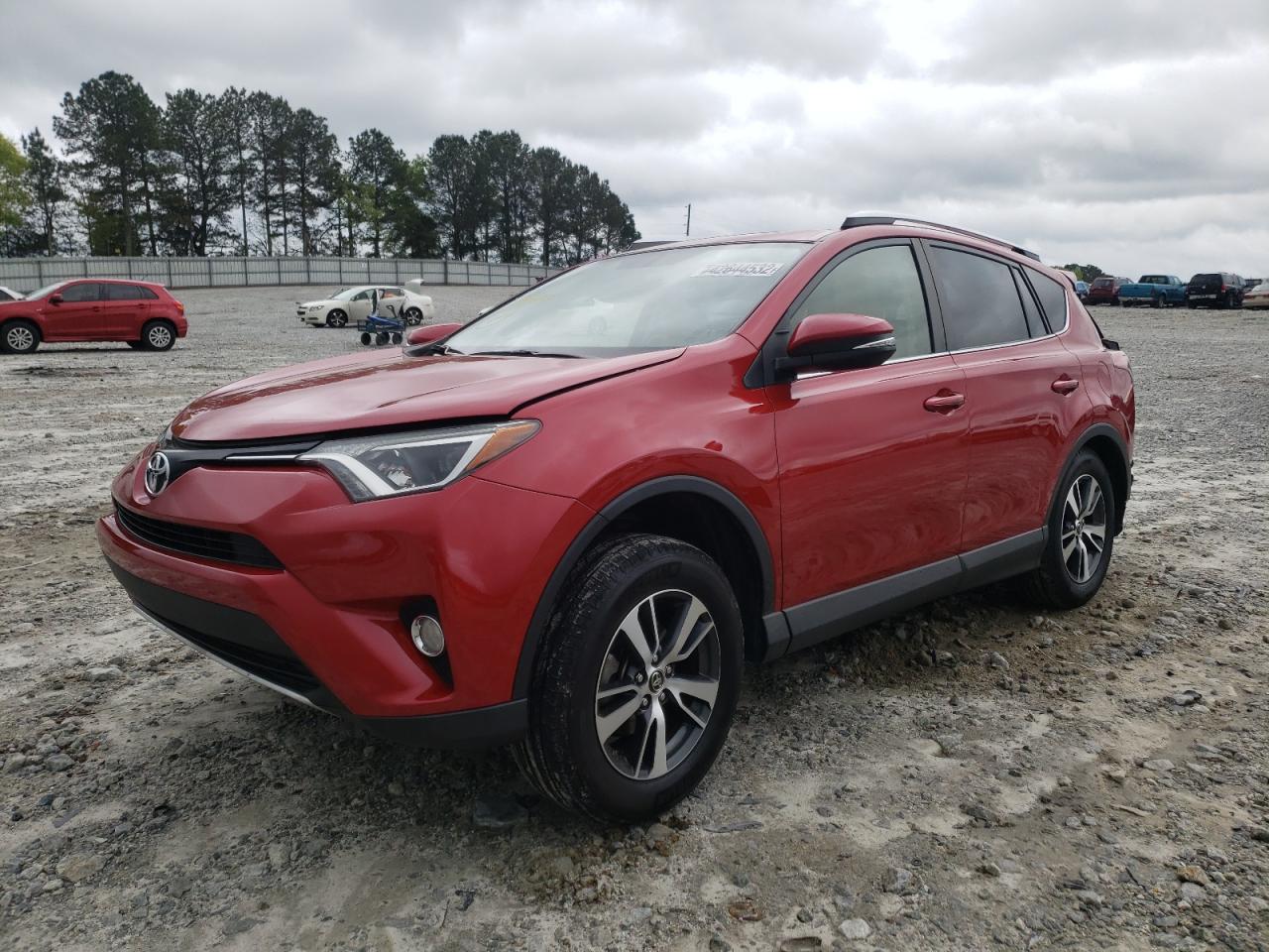 Photo 2 from auction – 2016 TOYOTA RAV4 XLE with VIN JTMWFREV3GJ069299