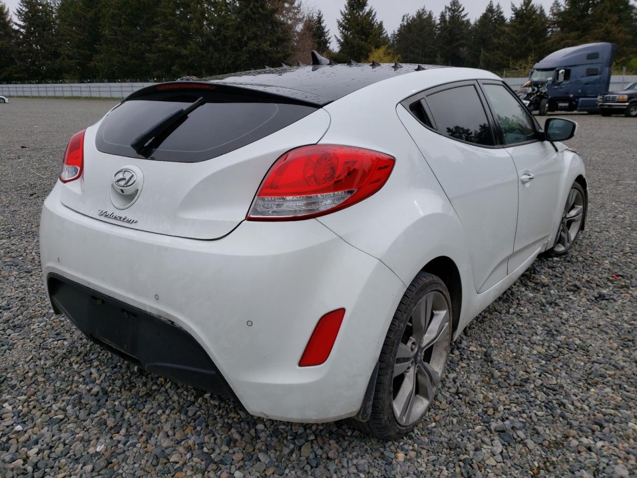 Photo 4 from auction – 2013 HYUNDAI VELOSTER with VIN KMHTC6AD6DU149449