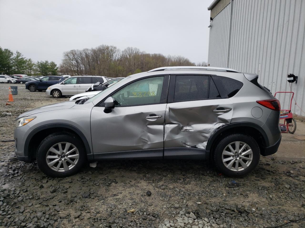 Photo 9 from auction – 2014 MAZDA CX-5 TOURI with VIN JM3KE4CY4E0335389