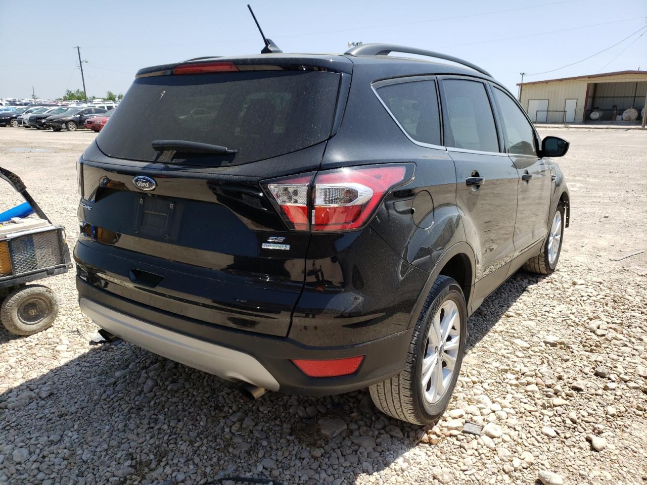 Photo 4 from auction – 2018 FORD ESCAPE SE with VIN 1FMCU0GD7JUA09388