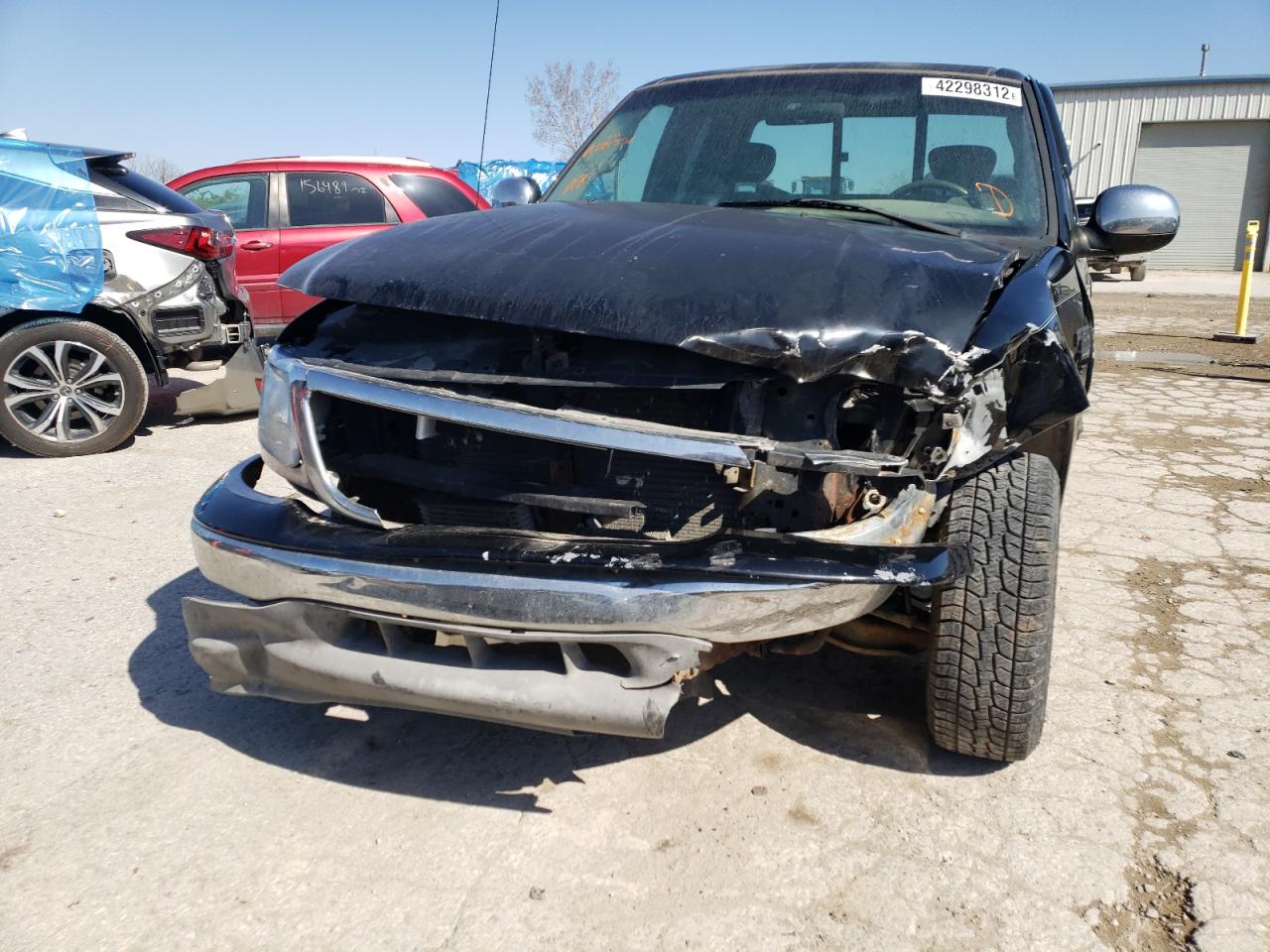 Photo 9 from auction – 2001 FORD F150 with VIN 1FTRX17L41NA88354