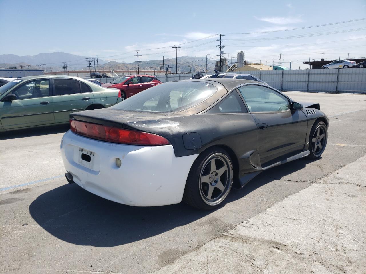 Photo 3 from auction – 1997 MITSUBISHI ECLIPSE RS with VIN 4A3AK34Y3VE079011