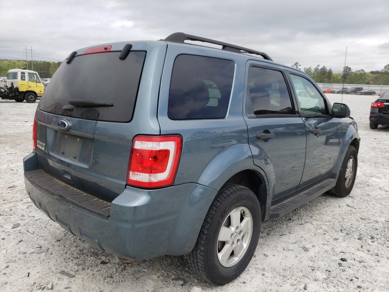 Photo 4 from auction – 2011 FORD ESCAPE XLT with VIN 1FMCU0D74BKC21659
