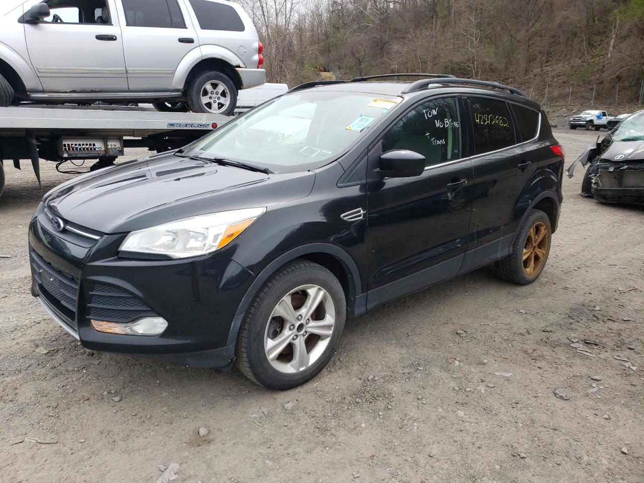 Photo 2 from auction – 2013 FORD ESCAPE SE with VIN 1FMCU9G95DUB65689