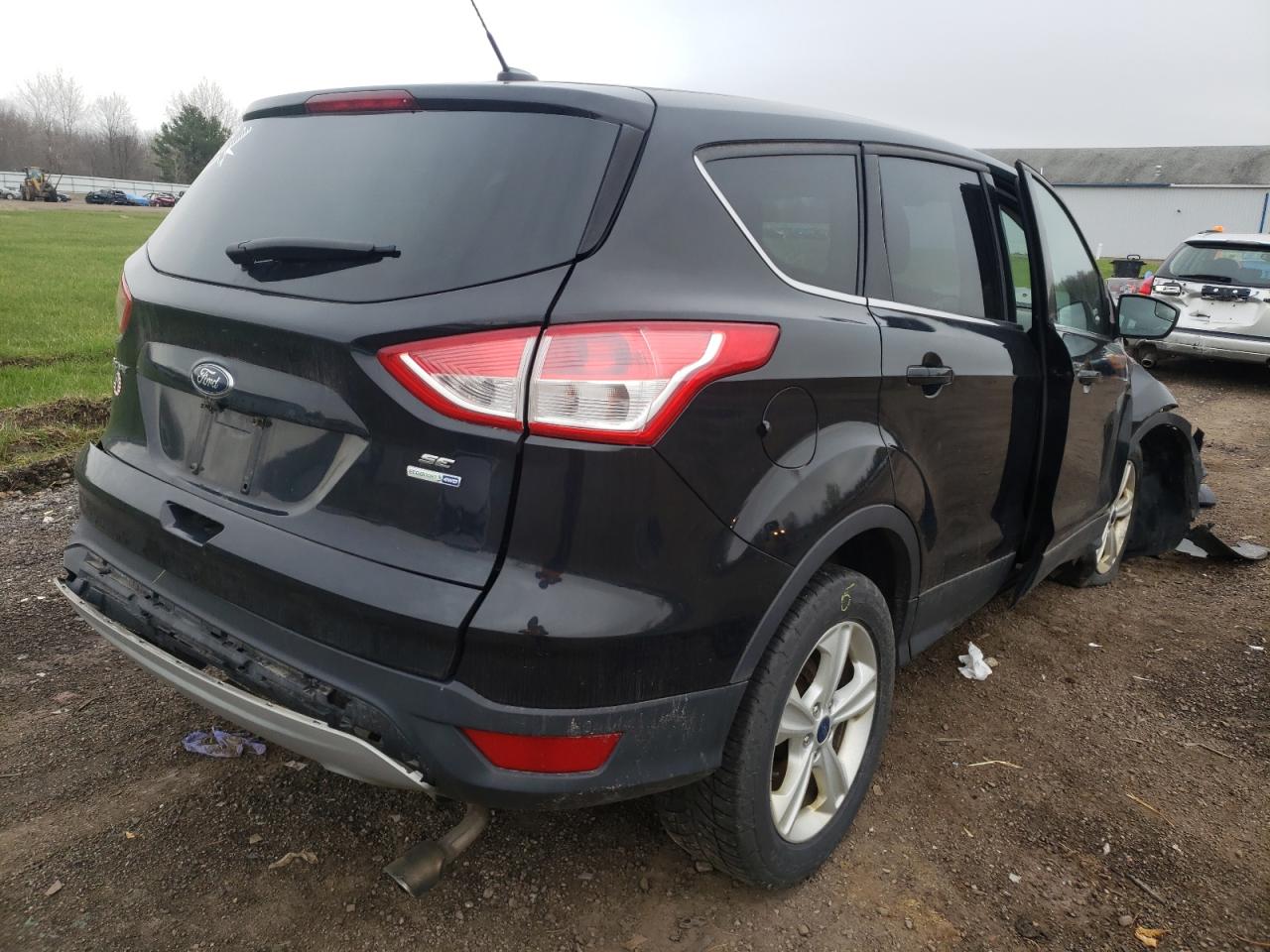 Photo 14 from auction – 2015 FORD ESCAPE SE with VIN 1FMCU9GX3FUB59634