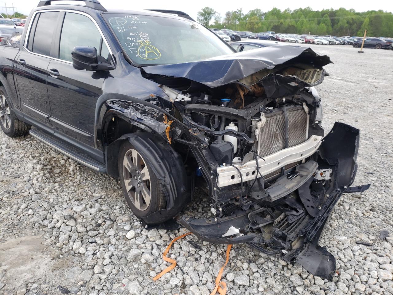 Photo 9 from auction – 2017 HONDA RIDGELINE with VIN 5FPYK2F62HB008190