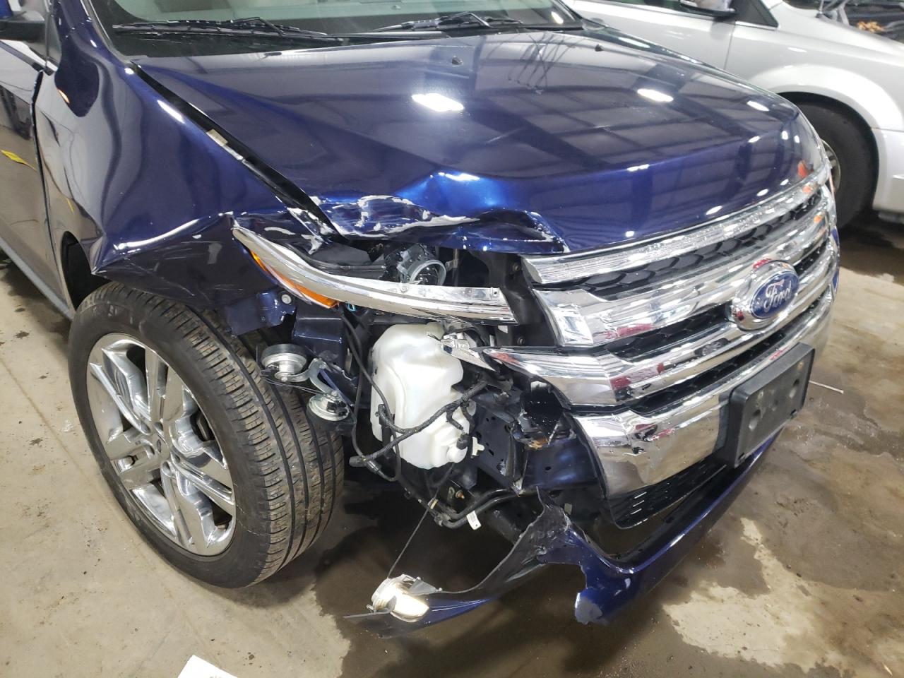 Photo 9 from auction – 2011 FORD EDGE LIMIT with VIN 2FMDK4KC1BBA42975