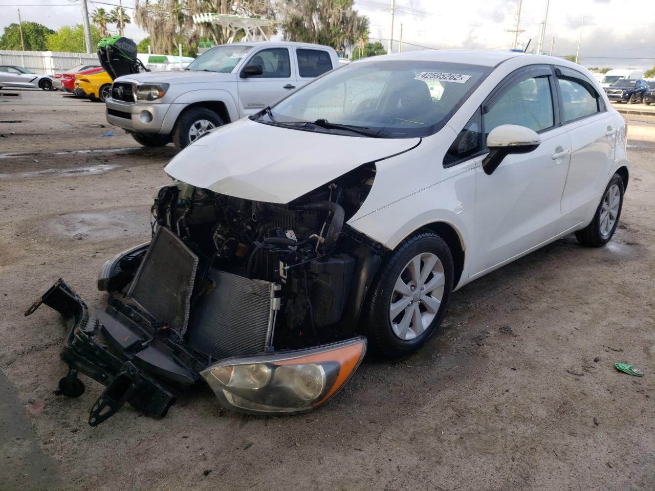 Photo 2 from auction – 2013 KIA RIO EX with VIN KNADN5A37D6195829