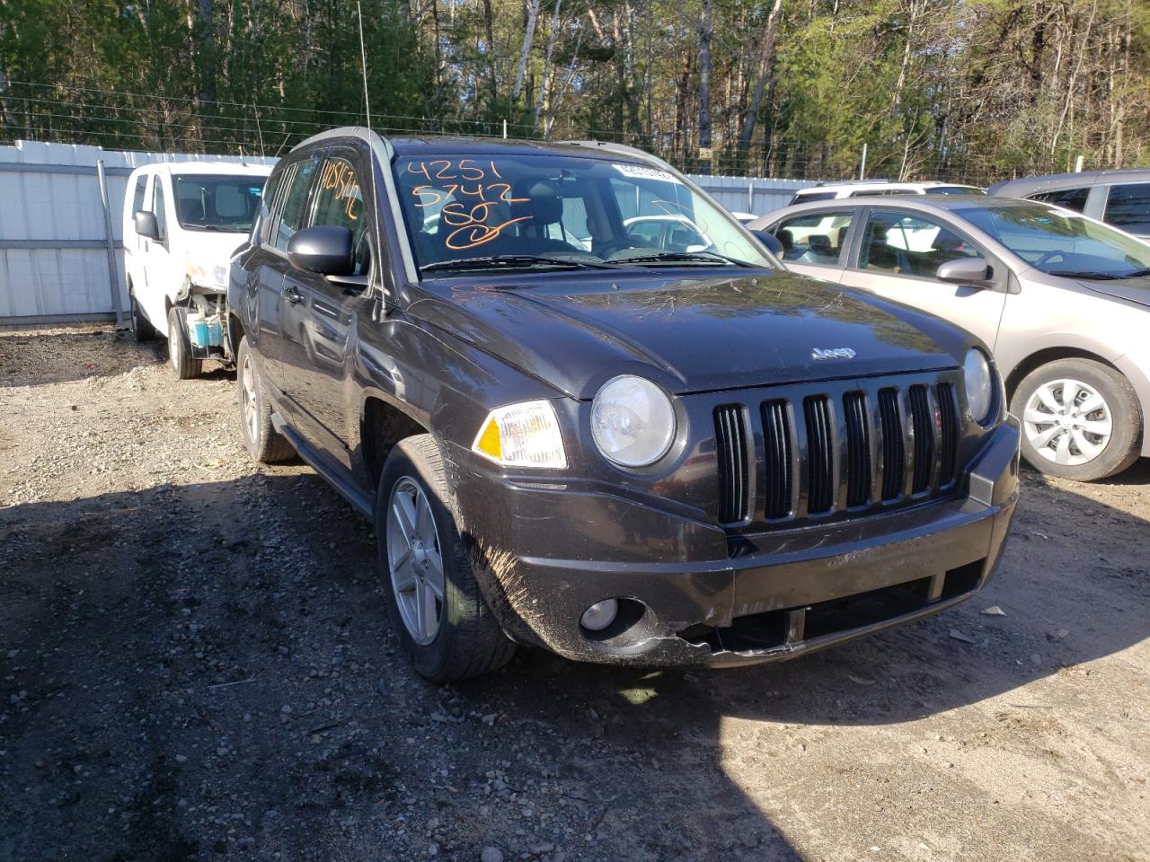 JEEP COMPASS SP 2010 with VIN 1J4NF4FB3AD631446 - Photo from auction