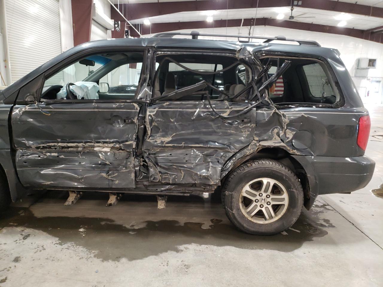 Photo 10 from auction – 2004 HONDA PILOT EX with VIN 2HKYF18404H514423