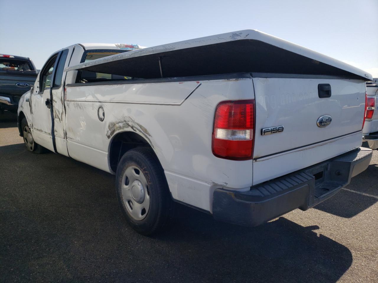 Photo 3 from auction – 2006 FORD F150 with VIN 1FTRF12286NB70905