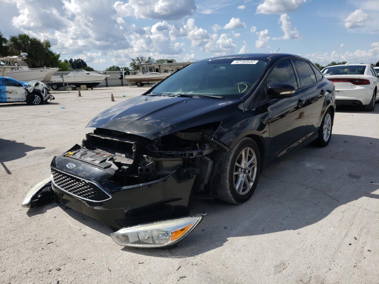 Photo 2 from auction – 2015 FORD FOCUS SE with VIN 1FADP3F27FL354618