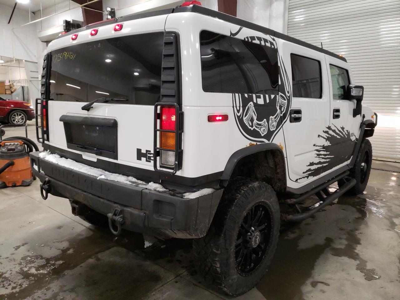 Photo 4 from auction – 2003 HUMMER H2 with VIN 5GRGN23U13H147734