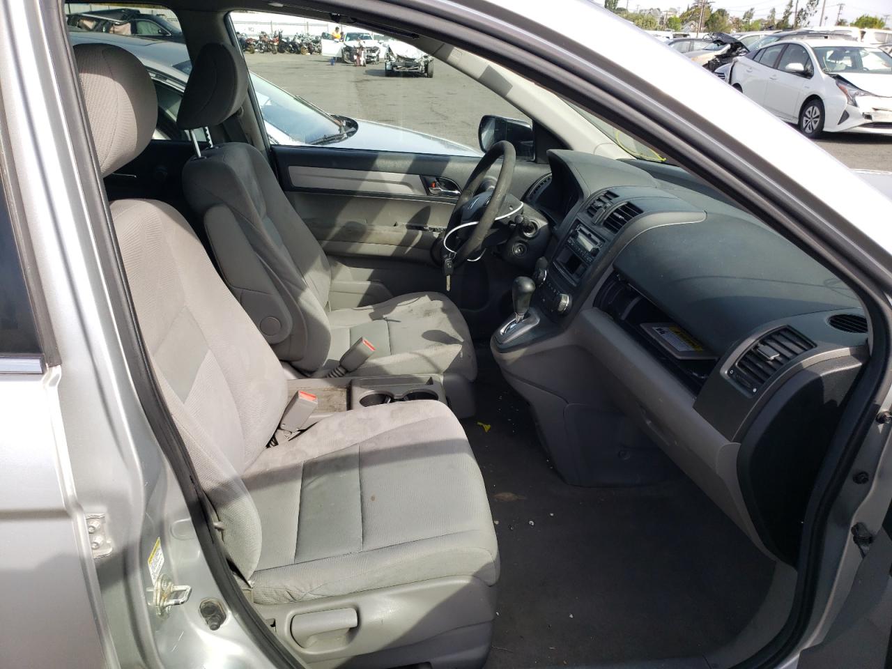 Photo 5 from auction – 2011 HONDA CR-V LX with VIN JHLRE3H30BC014641