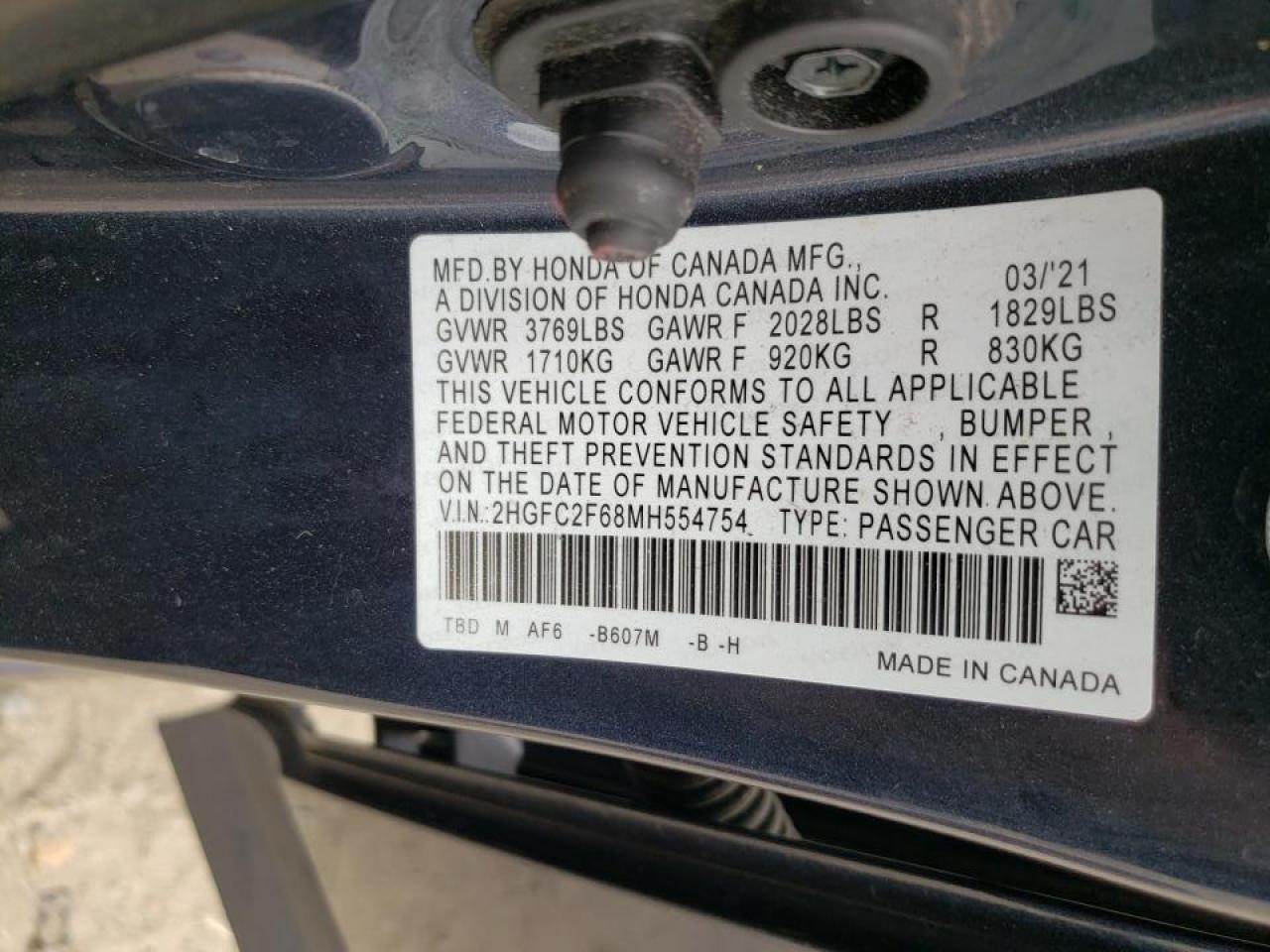 Photo 10 from auction – 2021 HONDA CIVIC LX with VIN 2HGFC2F68MH554754