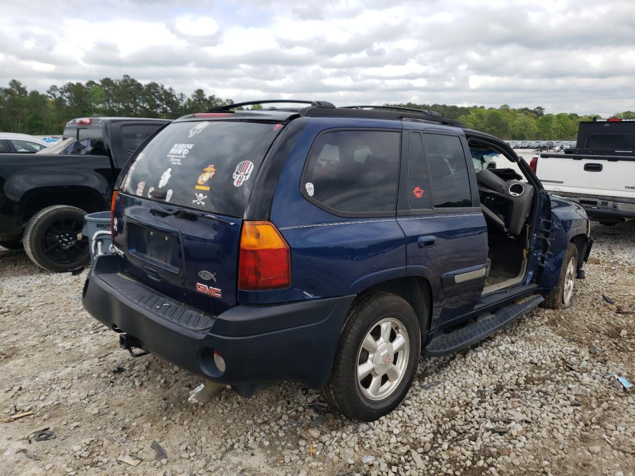 Photo 4 from auction – 2004 GMC ENVOY with VIN 1GKDS13S142210541