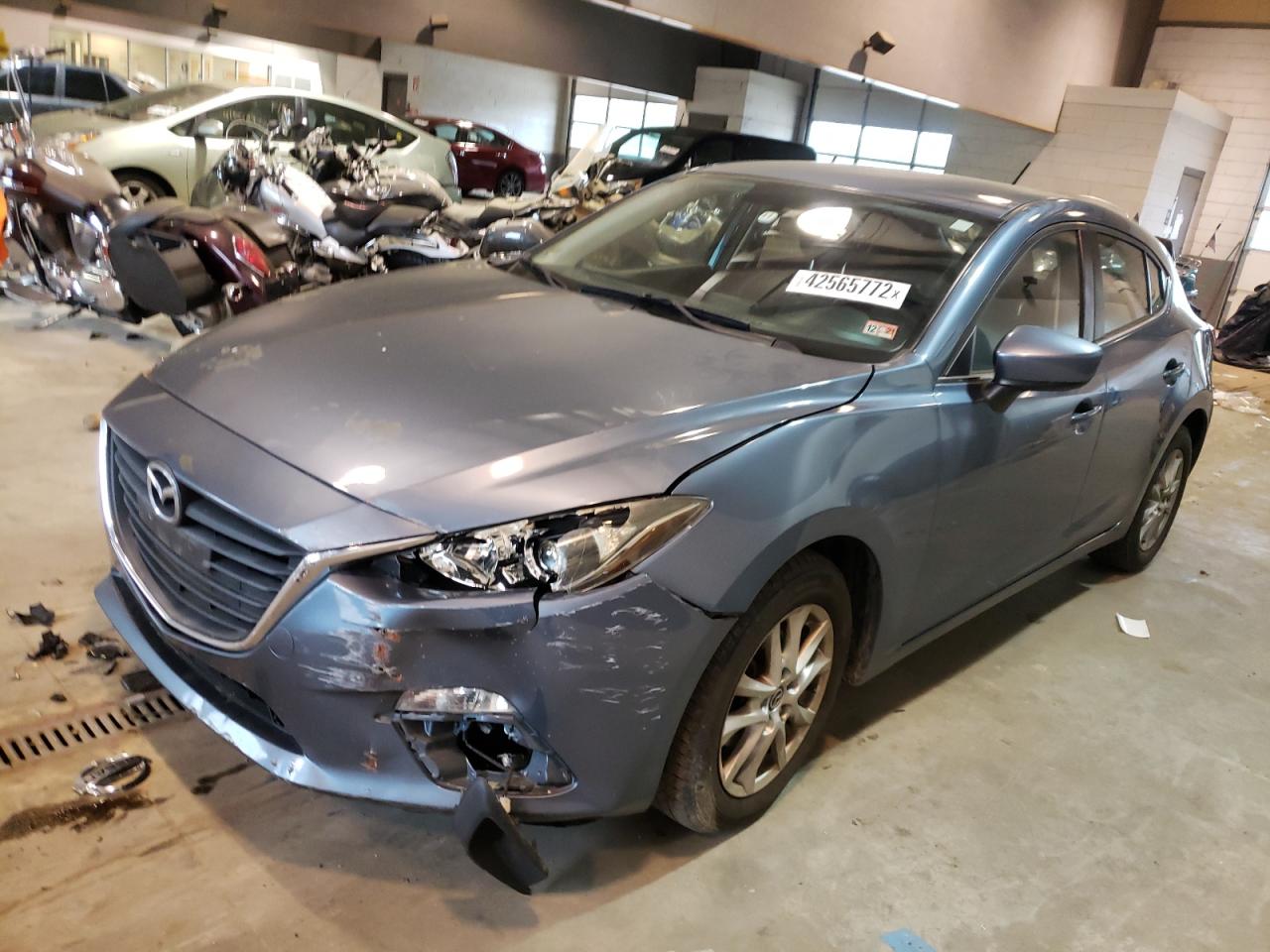 Photo 2 from auction – 2014 MAZDA 3 TOURING with VIN JM1BM1L79E1120568