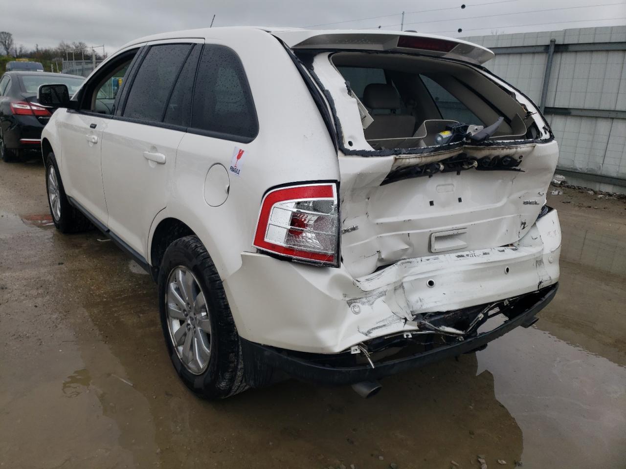 Photo 3 from auction – 2010 FORD EDGE with VIN 2FMDK3JC9ABB76398