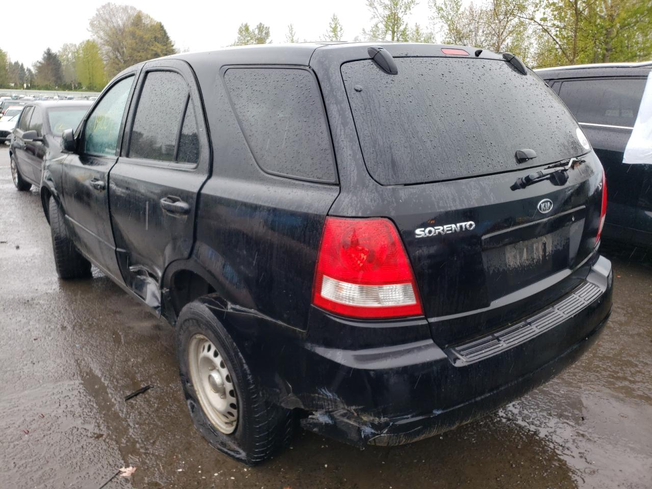 Photo 3 from auction – 2004 KIA SORENTO EX with VIN KNDJD733945198495
