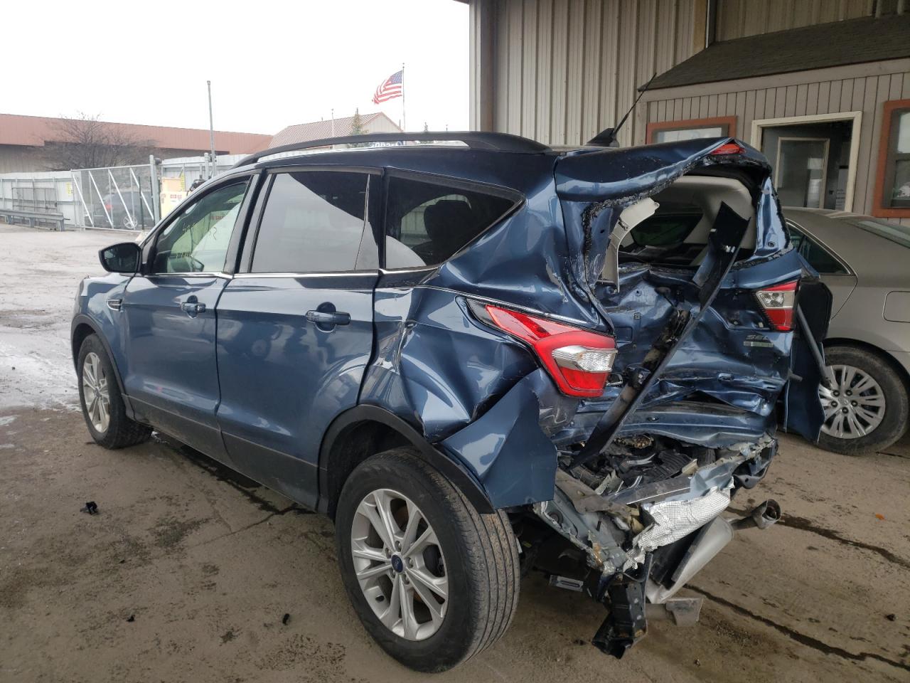 Photo 3 from auction – 2018 FORD ESCAPE SEL with VIN 1FMCU0HD4JUC32809