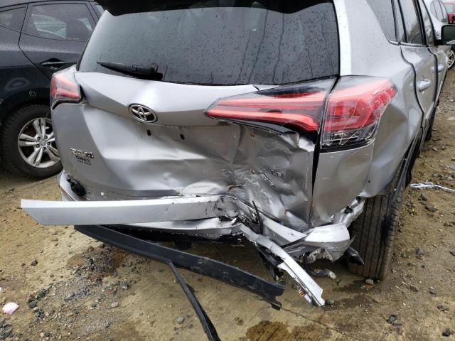 Photo 9 from auction – 2018 TOYOTA RAV4 LE with VIN JTMBFREV3JJ243698