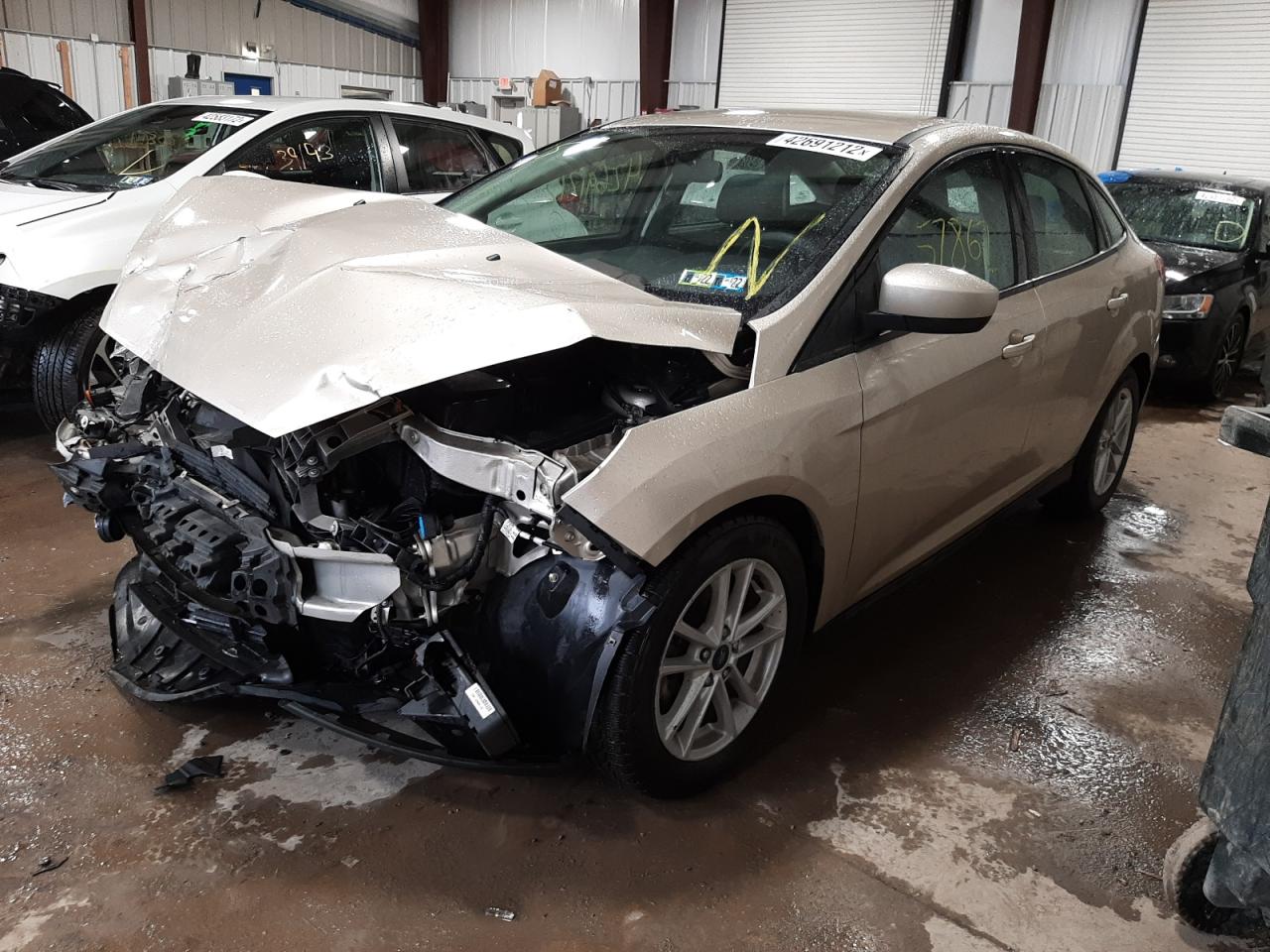 Photo 2 from auction – 2018 FORD FOCUS SE with VIN 1FADP3F27JL288676