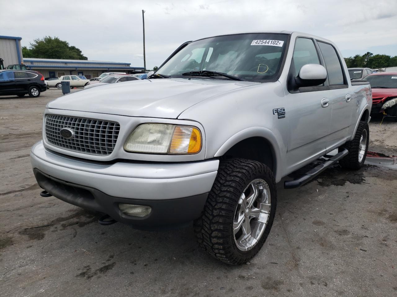 Photo 2 from auction – 2003 FORD F150 SUPER with VIN 1FTRW08603KD59453