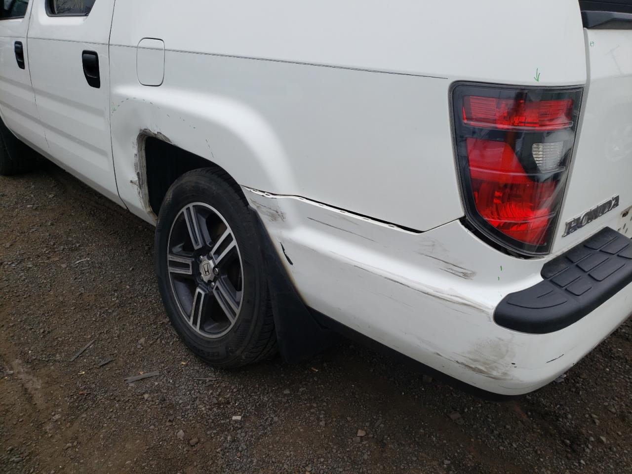 Photo 9 from auction – 2012 HONDA RIDGELINE with VIN 5FPYK1F74CB001768