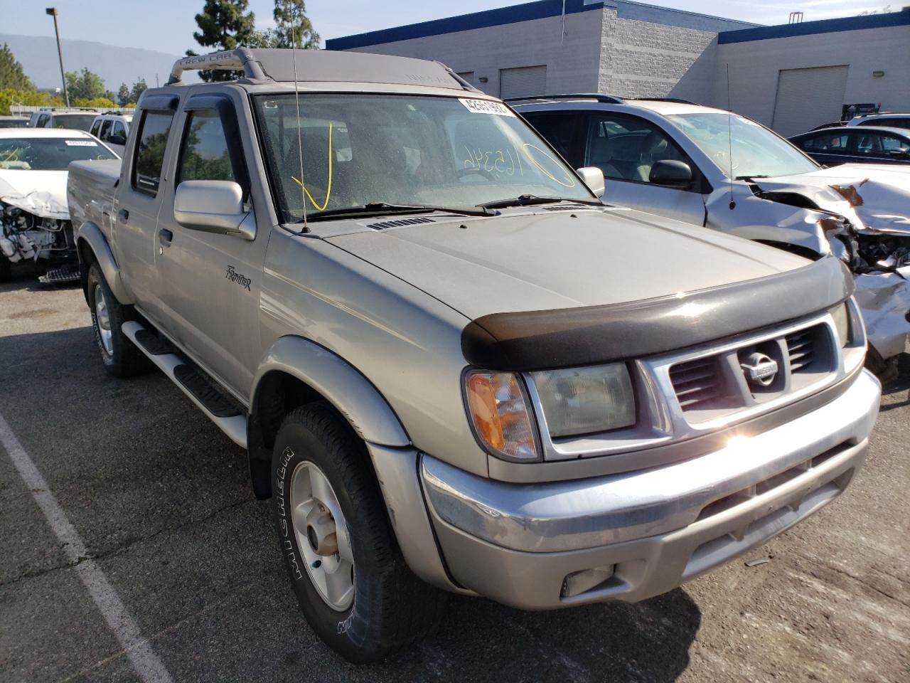NISSAN FRONTIER C 2000 with VIN 1N6ED27Y8YC371142 - Photo from auction
