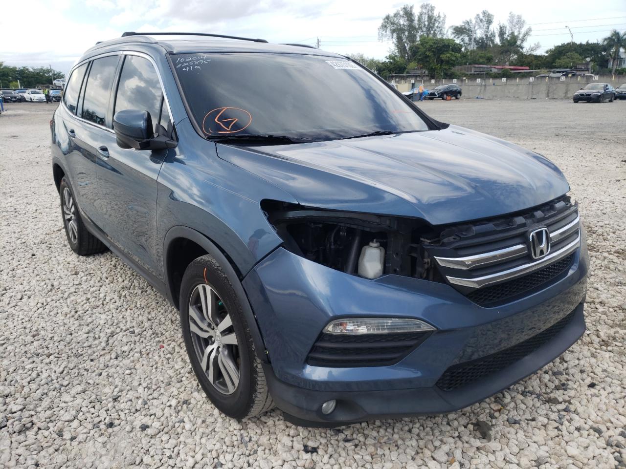 HONDA PILOT EXL 2016 with VIN 5FNYF5H52GB025895 - Photo from auction