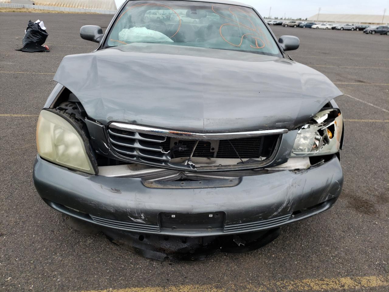 Photo 9 from auction – 2004 CADILLAC DEVILLE DT with VIN 1G6KF57944U142667