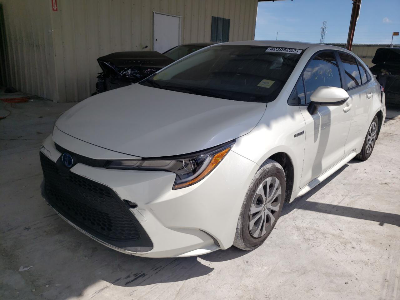 Photo 2 from auction – 2021 TOYOTA COROLLA LE with VIN JTDEAMDE8MJ032338
