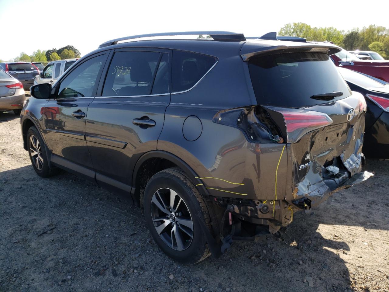 Photo 3 from auction – 2017 TOYOTA RAV4 XLE with VIN JTMWFREV1HJ704943