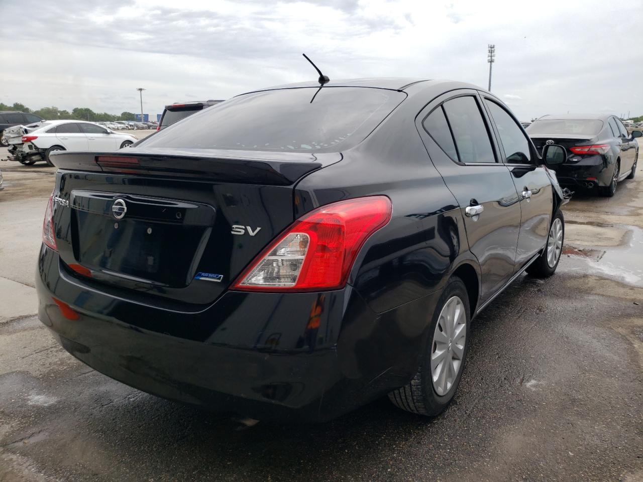 Photo 4 from auction – 2013 NISSAN VERSA S with VIN 3N1CN7AP1DL859242