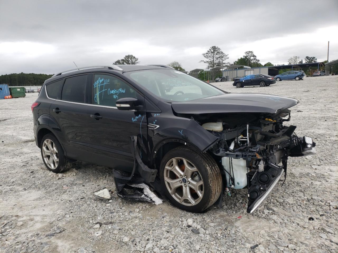 FORD ESCAPE TIT 2019 with VIN 1FMCU0J99KUA38686 - Photo from auction