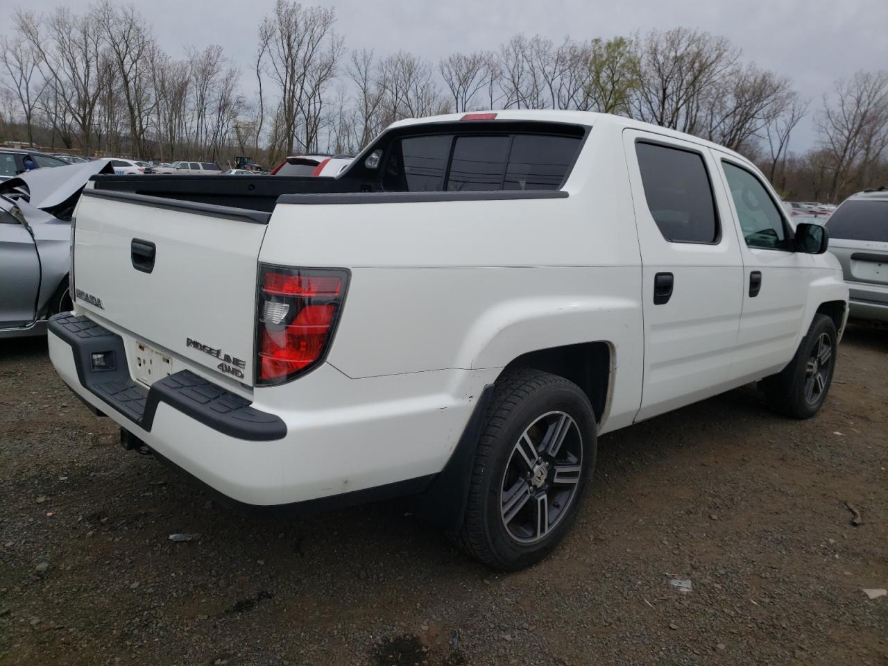 Photo 4 from auction – 2012 HONDA RIDGELINE with VIN 5FPYK1F74CB001768