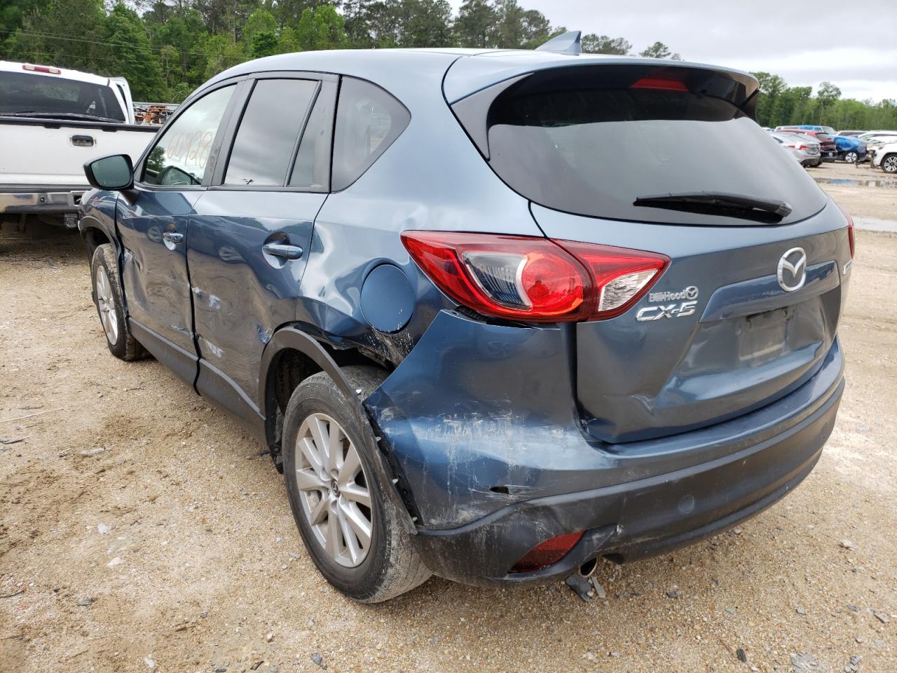 Photo 3 from auction – 2016 MAZDA CX-5 TOURI with VIN JM3KE2CY2G0813591